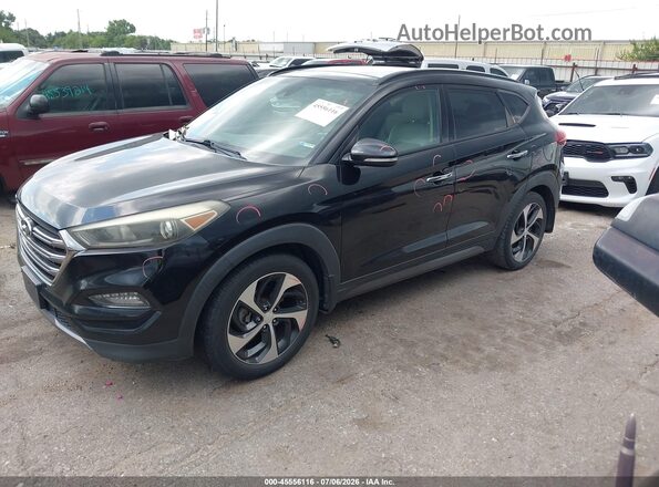 KM8J33A20GU204017 2016 HYUNDAI TUCSON Black 360 interior view