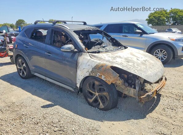 KM8J33A20HU387744 2017 HYUNDAI TUCSON Gray Front right