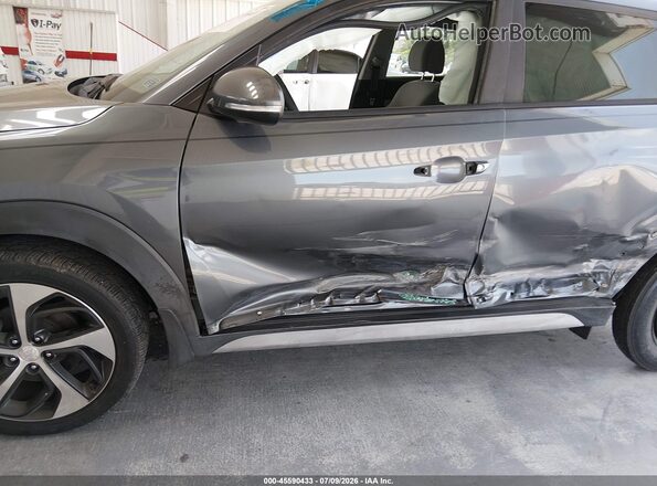 KM8J33A20HU397139 2017 HYUNDAI TUCSON Gray Widok z przodu