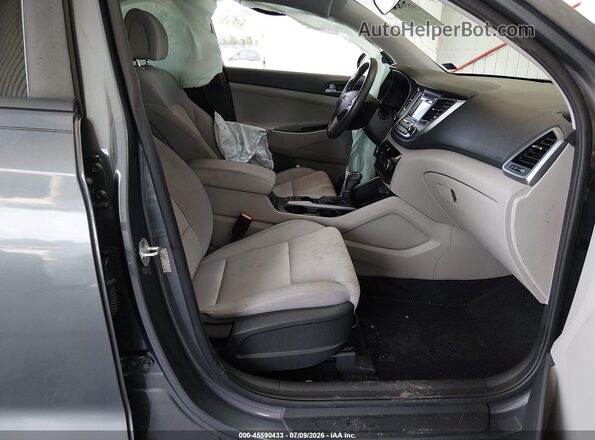 KM8J33A20HU397139 2017 HYUNDAI TUCSON Gray Widok wnętrza z przodu