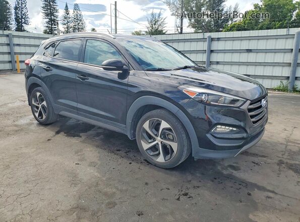 KM8J33A21GU212563 2016 HYUNDAI TUCSON Black Front right