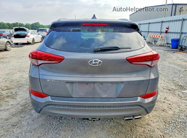 KM8J33A23GU199783 2016 HYUNDAI TUCSON Gray Widok z tyłu