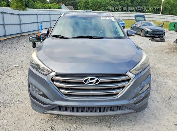 KM8J33A23GU199783 2016 HYUNDAI TUCSON Gray Widok z przodu