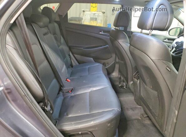 KM8J33A24GU148244 2016 HYUNDAI TUCSON Gray Սալոնի հետևի տեսք