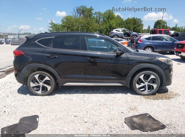 KM8J33A24JU737267 2018 HYUNDAI TUCSON Black Vista interior trasera