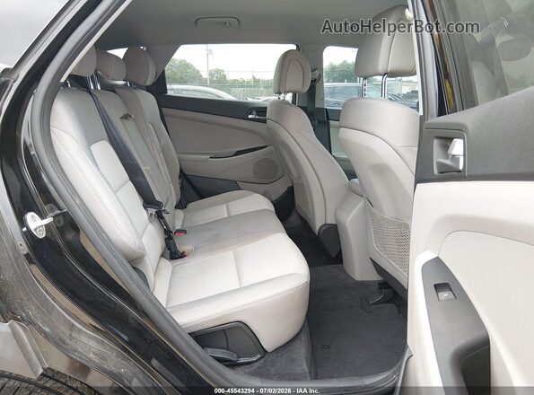KM8J33A25GU163139 2016 HYUNDAI TUCSON Black VIN კოდის სტიკერის ხედი