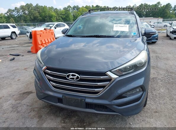 KM8J33A26GU103760 2016 HYUNDAI TUCSON Gray წინა ხედი