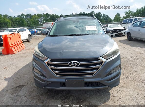 KM8J33A26GU103760 2016 HYUNDAI TUCSON Gray ხელსაწყოთა პანელის ხედი