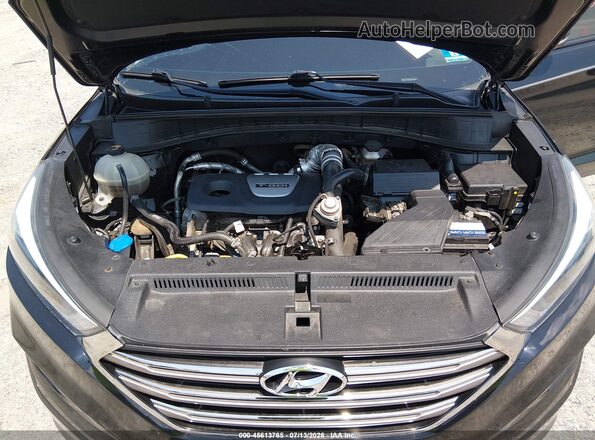 KM8J33A26GU139870 2016 HYUNDAI TUCSON Black Vista trasera