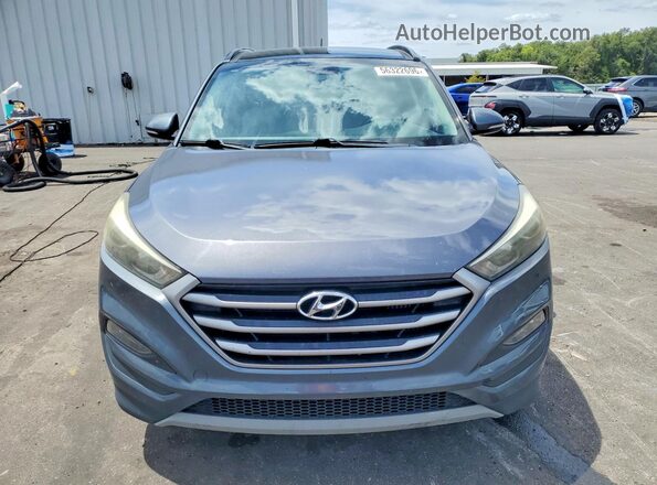 KM8J33A26HU575443 2017 HYUNDAI TUCSON Gray Front view
