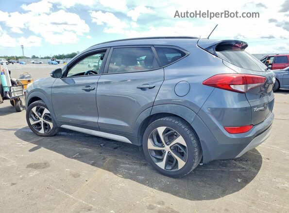 KM8J33A26HU575443 2017 HYUNDAI TUCSON Gray Rear left