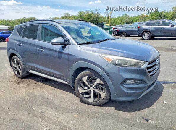 KM8J33A26HU575443 2017 HYUNDAI TUCSON Gray Front right