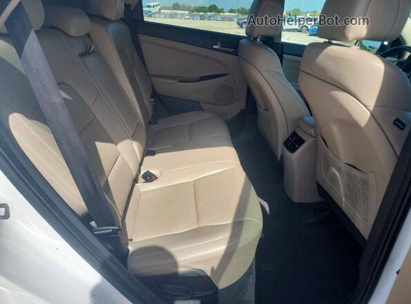 KM8J33A27JU809353 2018 HYUNDAI TUCSON White Rear interior view