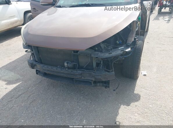 KM8J33A28GU100990 2016 HYUNDAI TUCSON Коричневый Вид спереди