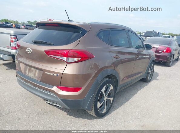 KM8J33A28GU100990 2016 HYUNDAI TUCSON Коричневый Задняя правая четверть