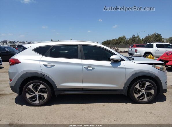 KM8J33A28GU263347 2016 HYUNDAI TUCSON Silver Widok wnętrza z tyłu