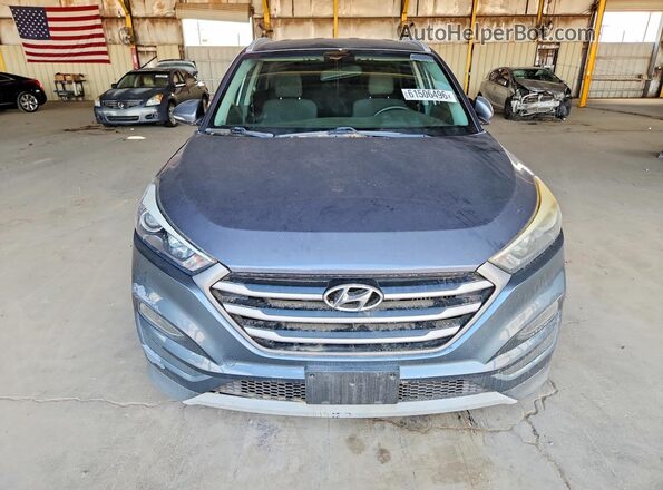 KM8J33A29HU377844 2017 HYUNDAI TUCSON Gray Front view