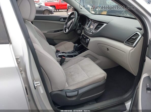KM8J33A2XGU081617 2016 HYUNDAI TUCSON Silver Front interior view