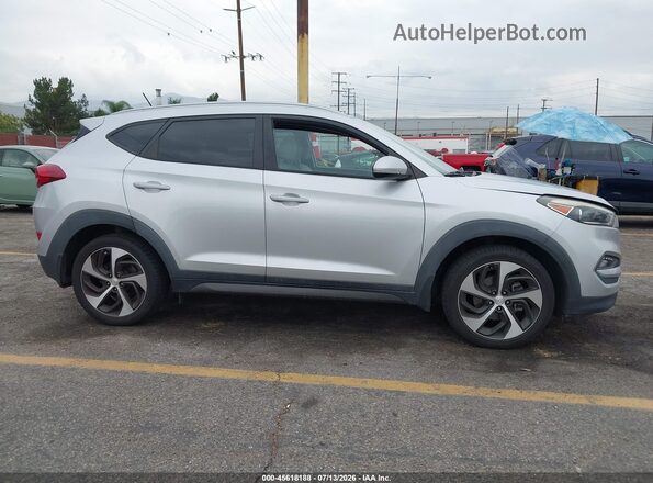 KM8J33A2XGU081617 2016 HYUNDAI TUCSON Silver Rear interior view