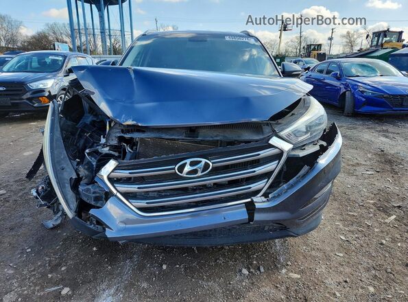 KM8J33A2XGU138608 2016 HYUNDAI TUCSON Gray Вид спереду
