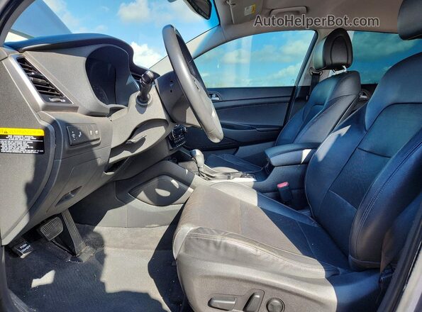 KM8J33A2XGU138608 2016 HYUNDAI TUCSON Gray Вид салону спереду