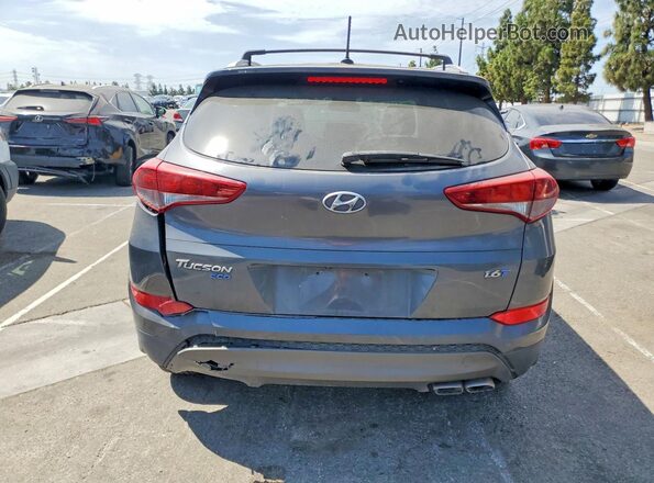 KM8J33A2XGU143520 2016 HYUNDAI TUCSON Серый Вид сзади