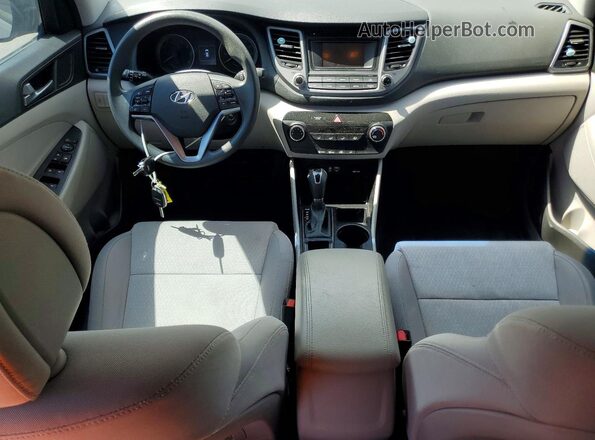 KM8J33A2XGU143520 2016 HYUNDAI TUCSON Серый Вид панели приборов