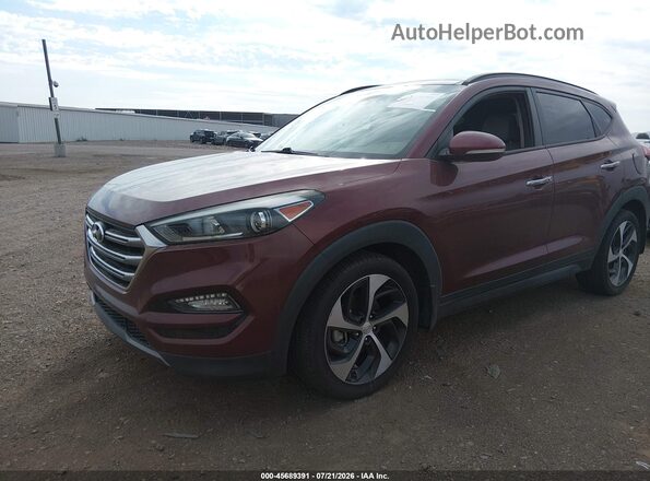 KM8J33A2XGU159698 2016 HYUNDAI TUCSON Burgundy Vista tres cuartos delantera izquierda