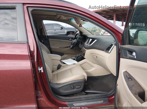 KM8J33A2XGU159698 2016 HYUNDAI TUCSON Burgundy Vista interior delantera