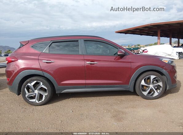 KM8J33A2XGU159698 2016 HYUNDAI TUCSON Burgundy Vista interior trasera