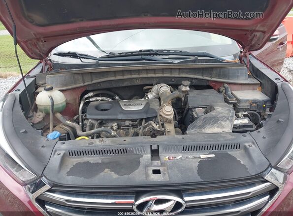 KM8J33A2XGU176758 2016 HYUNDAI TUCSON Бордовый Вид сзади