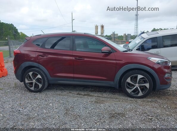 KM8J33A2XGU176758 2016 HYUNDAI TUCSON Бордовый Вид задней части салона