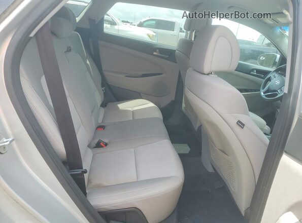 KM8J33A2XGU183029 2016 HYUNDAI TUCSON Silver Widok wnętrza z tyłu