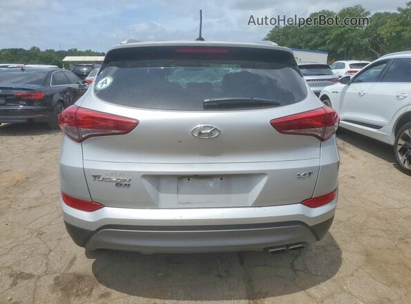 KM8J33A2XGU183029 2016 HYUNDAI TUCSON Silver Widok z tyłu