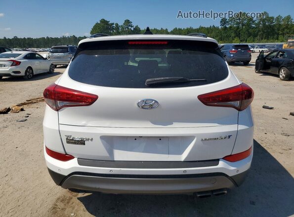 KM8J33A2XGU257355 2016 HYUNDAI TUCSON White Vista trasera