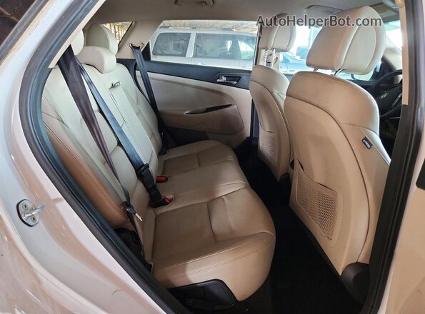 KM8J33A2XGU268601 2016 HYUNDAI TUCSON White Rear interior view