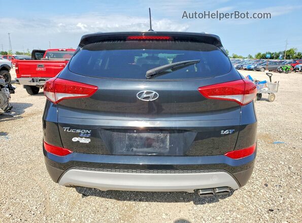 KM8J33A2XHU283049 2017 HYUNDAI TUCSON Black Rear view