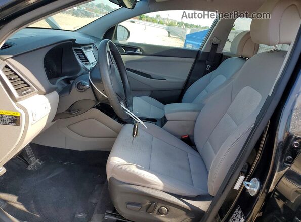 KM8J33A2XHU283049 2017 HYUNDAI TUCSON Black Front interior view