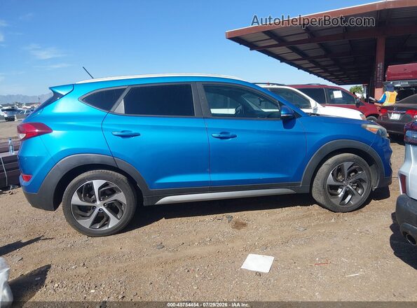 KM8J33A2XHU310802 2017 HYUNDAI TUCSON Blue Սալոնի հետևի տեսք