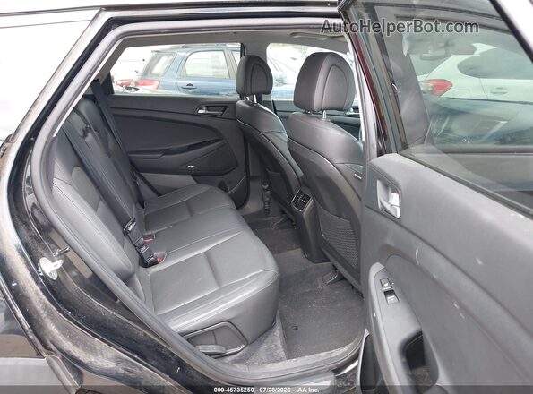 KM8J33A2XHU330323 2017 HYUNDAI TUCSON Black Vista de la etiqueta del VIN