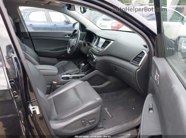 KM8J33A2XHU330323 2017 HYUNDAI TUCSON Black Vista interior delantera
