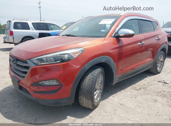 KM8J33A40GU059109 2016 HYUNDAI TUCSON Orange Առջևի ձախ երեք քառորդ տեսարան