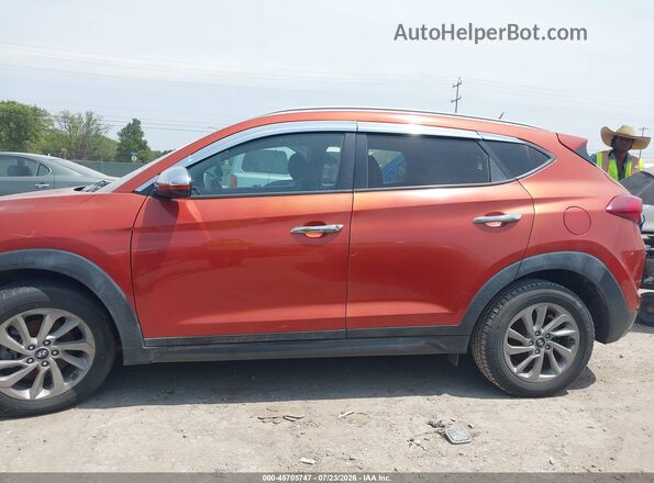 KM8J33A40GU059109 2016 HYUNDAI TUCSON Orange Սալոնի հետևի տեսք