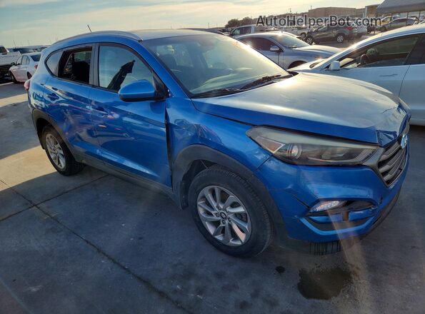 KM8J33A40GU129059 2016 HYUNDAI TUCSON Blue Front right