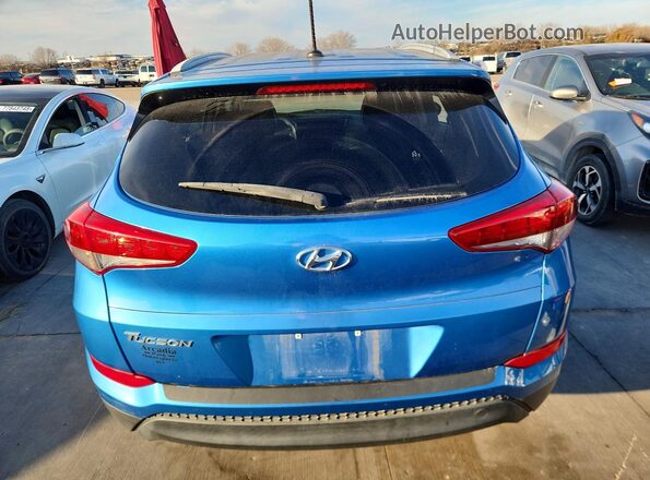KM8J33A40GU129059 2016 HYUNDAI TUCSON Blue Rear view