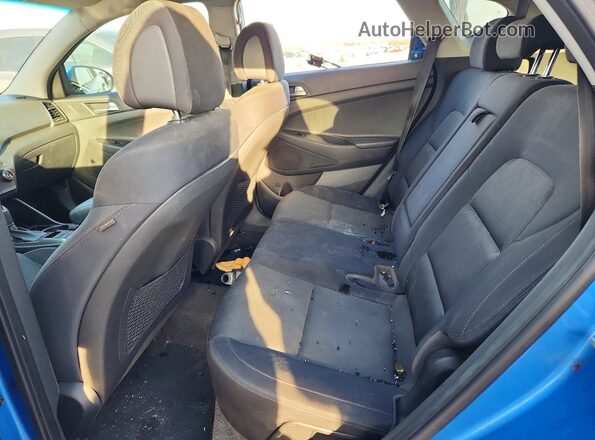 KM8J33A40GU129059 2016 HYUNDAI TUCSON Blue Rear interior view