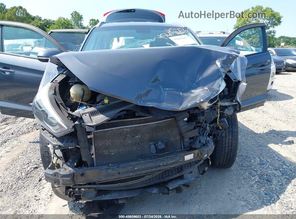 KM8J33A40HU445885 2017 HYUNDAI TUCSON Gray Вид задньої частини салону