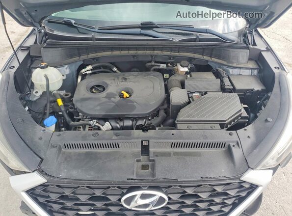 KM8J33A40KU078316 2019 HYUNDAI TUCSON Gray Rear interior view