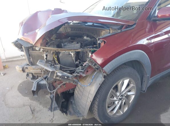 KM8J33A41GU029245 2016 HYUNDAI TUCSON Burgundy Вид задньої частини салону
