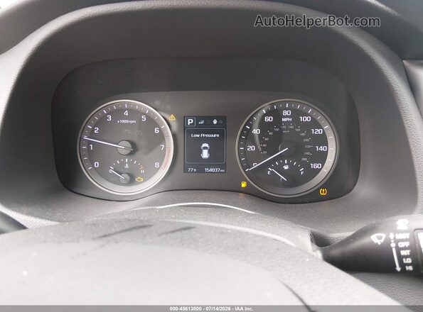 KM8J33A41GU196799 2016 HYUNDAI TUCSON Blue Vista de los asientos traseros